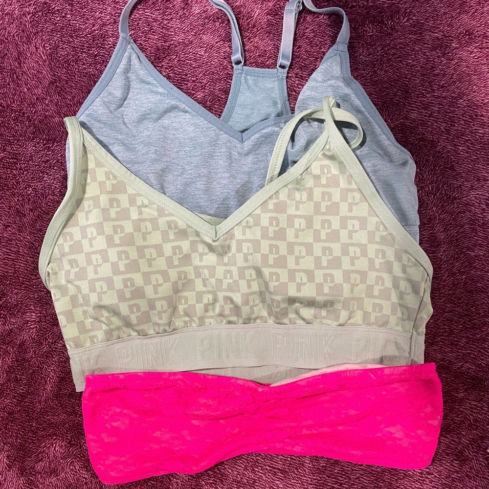 Victoria secret sports bras and 1 strapless bra.